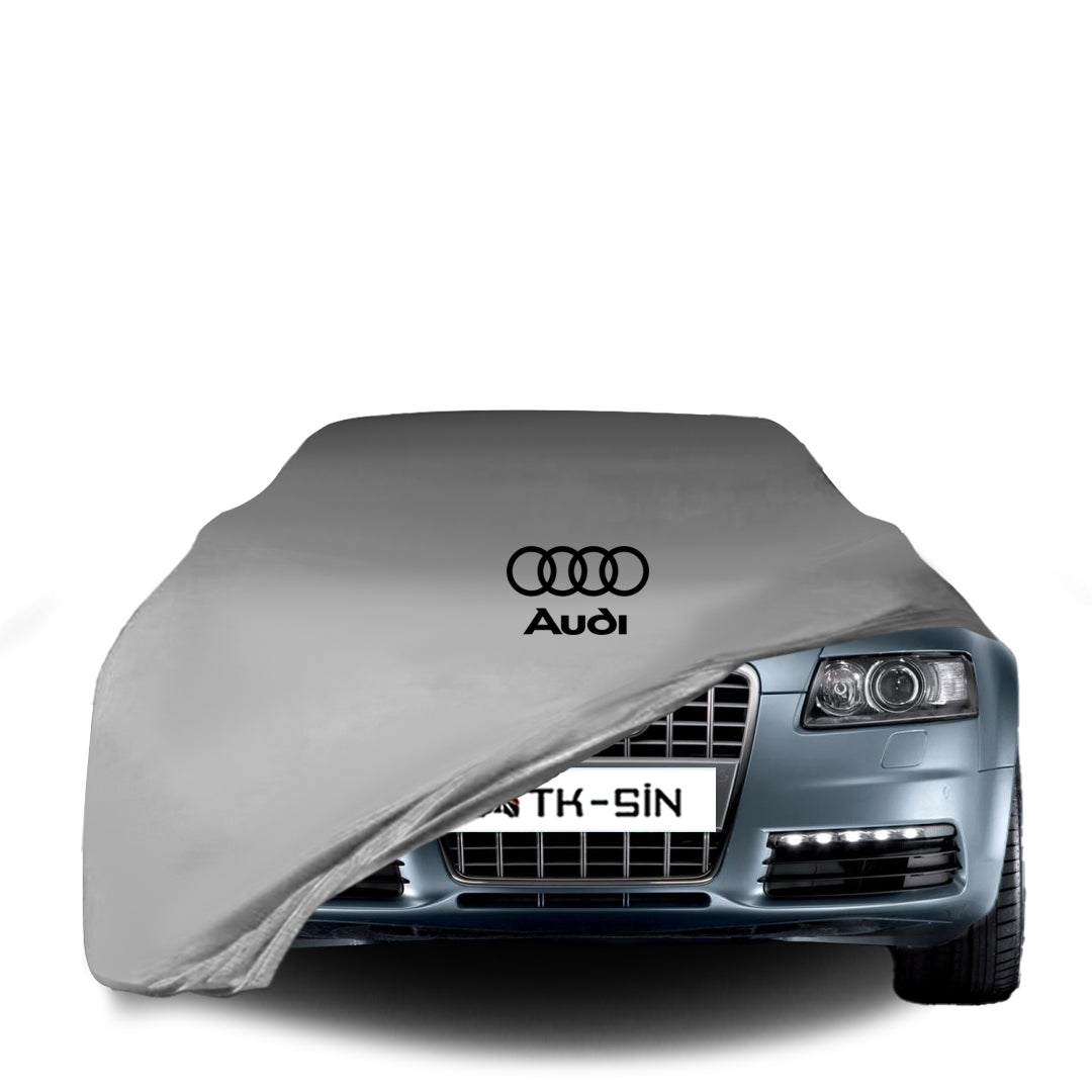 Audi RS6 A6 4F C6 Limousine mit maßgeschneiderter Indoor-Autoabdeckung in einer Garage in Deutschland